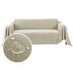 Khaki waterproof dog couch cover draped over a three-seat sofa
