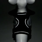 Black reflective vest on a mannequin against a dark background- AZPaws