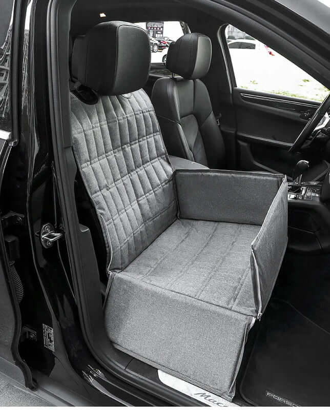 Dog car seat cover with adjustable headrest straps staying firm with active large dog on board | AZPaws